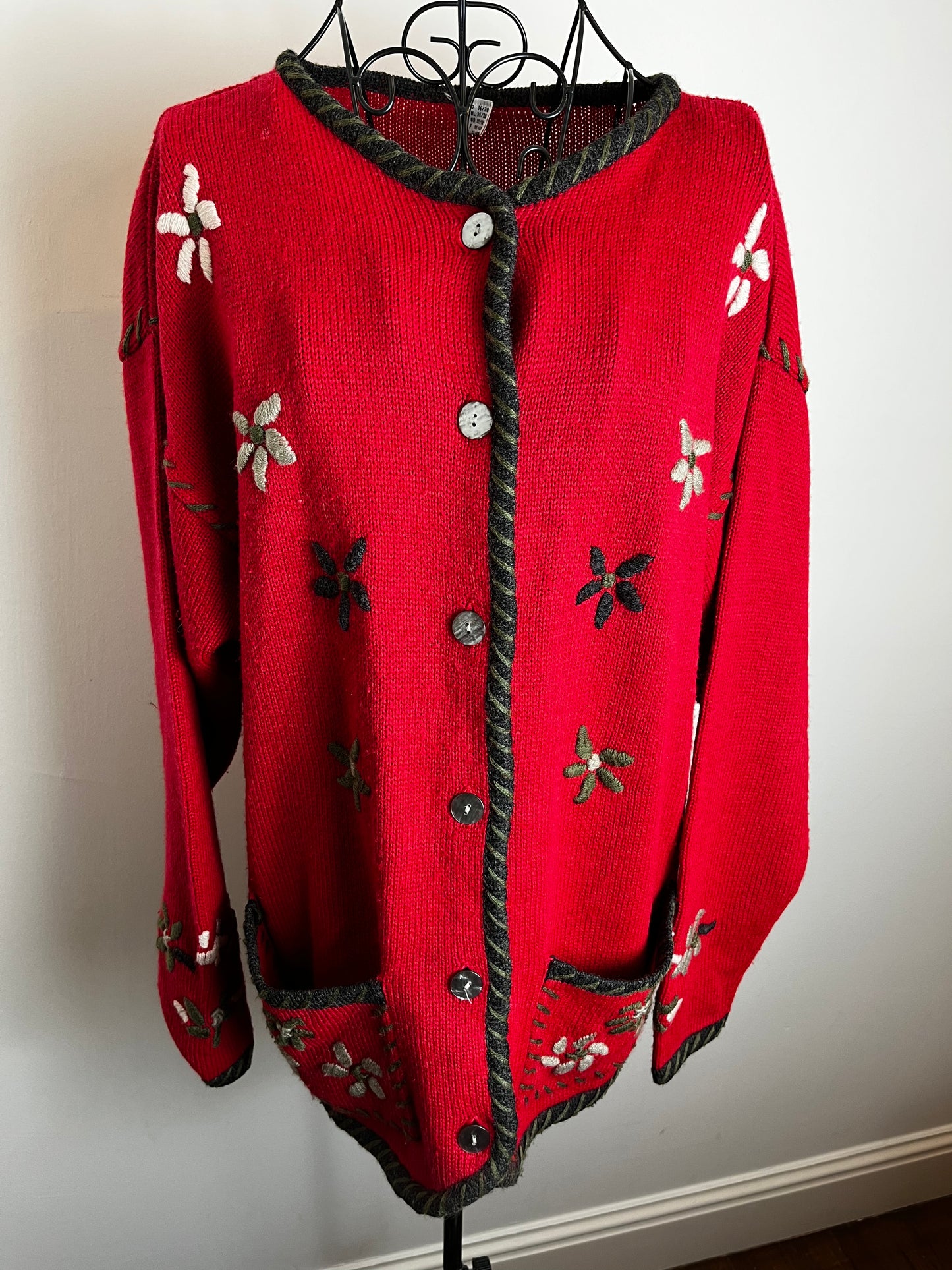 Red embroidered cardigan.