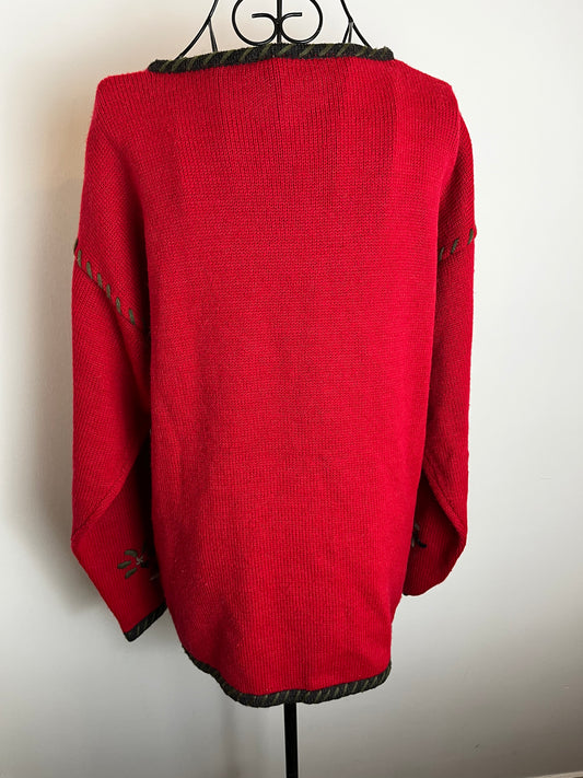 Red embroidered cardigan.