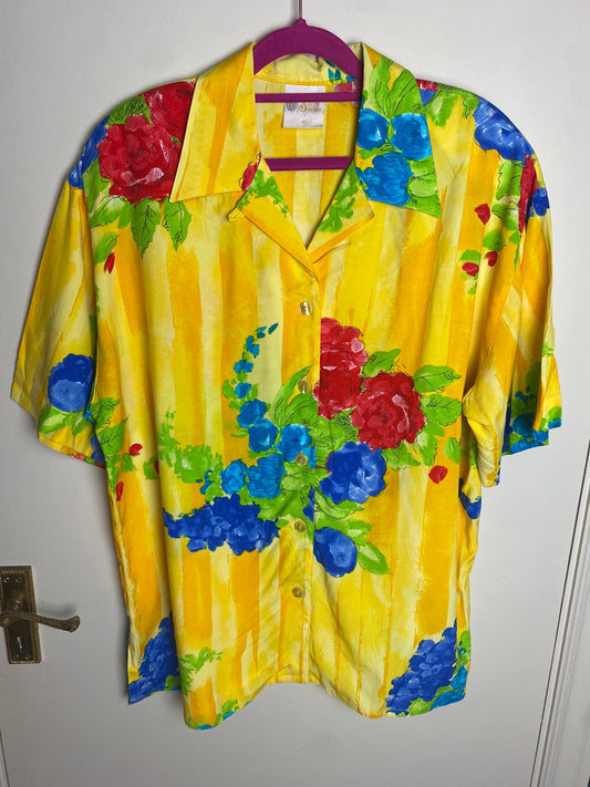 Bright yellow Sixth Sense shirt